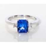 A TANZANITE AND DIAMOND RING