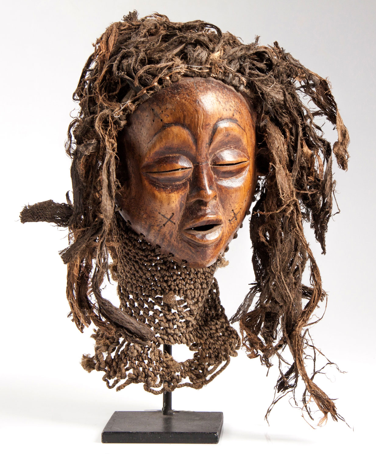 A CHOKWE FEMALE MASK, ANGOLA