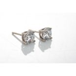 A PAIR OF DIAMOND EAR STUDS