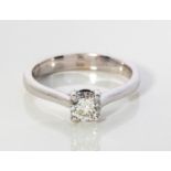 A DIAMOND SOLITAIRE RING