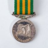 A DANIE THERON MINIATURE MEDAL