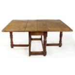 A CAPE TEAK AND YELLOWWOOD GATELEG TABLE