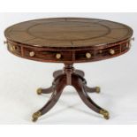 A REGENCY MAHOGANY DRUM TABLE