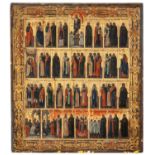 A RUSSIAN-UKRAINIAN TEMPERA ON WOOD ICON OF CHRIST AMONGST SAINTS AND DISCIPLES, 19TH CENTURY