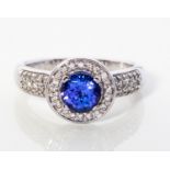A TANZANITE AND DIAMOND RING, FOREVER