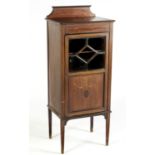 AN EDWARDIAN MAHOGANY MUSIC CABINET