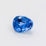 AN UNMOUNTED ROUNDED PEAR-SHAPED MIXED-CUT SAPPHIRE