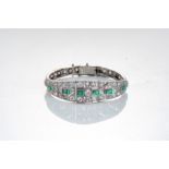 A DIAMOND AND EMERALD BRACELET