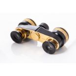 A PAIR OF OPERA GLASSES With gold floriate detail, accompanied by an original leather box