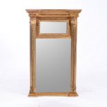 A GEORGE III GILTWOOD MIRROR The moulded breakfront cornice above a rectangular plate within a
