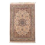 A SILK BASE ISFAHAN RUG, IRAN, MODERN condition: fair 227 by 151cm