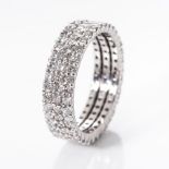 A DIAMOND TRIPLE ROW ETERNITY RING claw set with approximately 2,50 carats of round brilliant cut