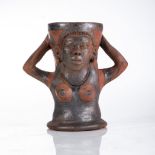 Noria Mabasa (South African 1938-) A CLAY FIGURAL POT