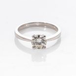 A PLATINUM SOLITAIRE RING Claw-set to the centre with a round brilliant-cut diamond weighing 0,