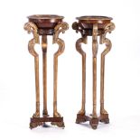 A PAIR OF WALNUT JARDINIERES, 19TH CENTURY Circular, each with a gadrooned rim, foliate-carved and
