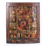 A RUSSIAN TEMPERA ON WOOD ICON, 19TH CENTURY Boldly painted across four registers with scenes from
