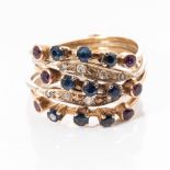 A DIAMOND AND SAPPHIRE RING Five loose bands, joined at the bottom of the shank, set to the top with