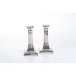 A PAIR OF DUTCH SILVER CANDLE STICKS, MAKER'S MARK GB, 1887 Each modelled as a column, the base