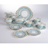 AN AYNSLEY 'DAISY PETALS' FLORAL CHINTZ PART TEA SET, 1930s Comprising: a teapot, 6 corset tea cups,