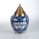 A DUTCH DELFT BLUE AND WHITE 'PORTORICO' TOBACCO JAR, 19TH CENTURY With tapering stepped brass