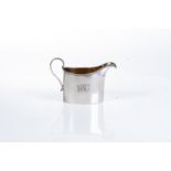 A GEORGE III SILVER CREAMER, MAKER'S MARK RUBBED, LONDON 1801 Beaded rim, reeded handle, gilt
