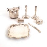 A COLLECTION OF SILVER MINIATURES Comprising: a pair of candlesticks, a tray, a box and cover, a