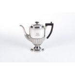 A VICTORIAN SILVER COFFEE POT, HENRY MATTHEWS, BIRMINGHAM, 1898 Oval, hinged gadrooned cover with