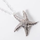 A TIFFANY AND CO PENDANT Designed as a Starfish pave set with diamonds hallmarked Tiffany & Co on