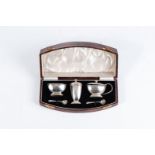 A GEORGE V CASED SILVER CONDIMENT SET, ADIE BROTHERS LIMITED, BIRMINGHAM 1913 Comprising: a salt and