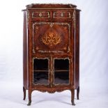 A FRENCH KINGSWOOD AND GILT-METAL MOUNTED CABINET, 19TH CENTURY The shaped and moulded marble top
