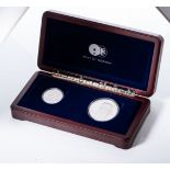 A NOBEL LAUREATES SET 2011 A 1oz silver coin and a 1oz platinum coin.Accompanied by box and