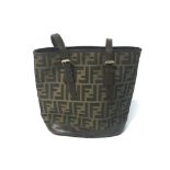 A FENDI HANDBAG Monogram canvas in gold and brown print, brown leather handles, with zip, 30cm wide,