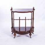 A VICTORIAN WALNUT AND INLAID DAVENPORT WHATNOT The hinged rectangular sloping top with a gilt-