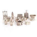 A COLLECTION OF CONTINENTAL SILVER MINIATURES Comprising: a kettle, a teapot, a chest, a burner, a