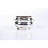 A SILVER SUGAR BOWL Oval, reeded bulbous body with opposing handles15cm wide over handles, 324g