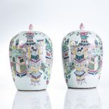 A PAIR OF CHINESE FAMILLE ROSE JARS AND COVERS, QING DYNASTY, 19TH CENTURY Each ovoid body painted
