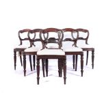 A SET OF SIX WILLIAM IV MAHOGANY SIDE CHAIRS Each curved top rail carved with scrolls, carved mid