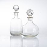 GEORG JENSEN: TWO GLASS DECANTERS The lager: 26cm high (2)