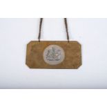 RHODESIAN HEADMAN'S GORGET 1920-1953. Brass gorget. 11,5 by 6cm, with the Royal Coat of Arms and