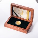 A COMMEMORATIVE COIN/MEDAL ROBBEN ISLAND 1964-1982 A ½ oz 24ct gold coinAccompanied by box and