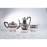 A GEORGE V SILVER THREE PIECE TEA SET, JAMES DEAKIN AND SONS, SHEFFIELD 1932 Comprising: a hot water