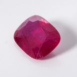 AN UNMOUNTED RUBY The cushion-cut ruby weighing 19,85 carats