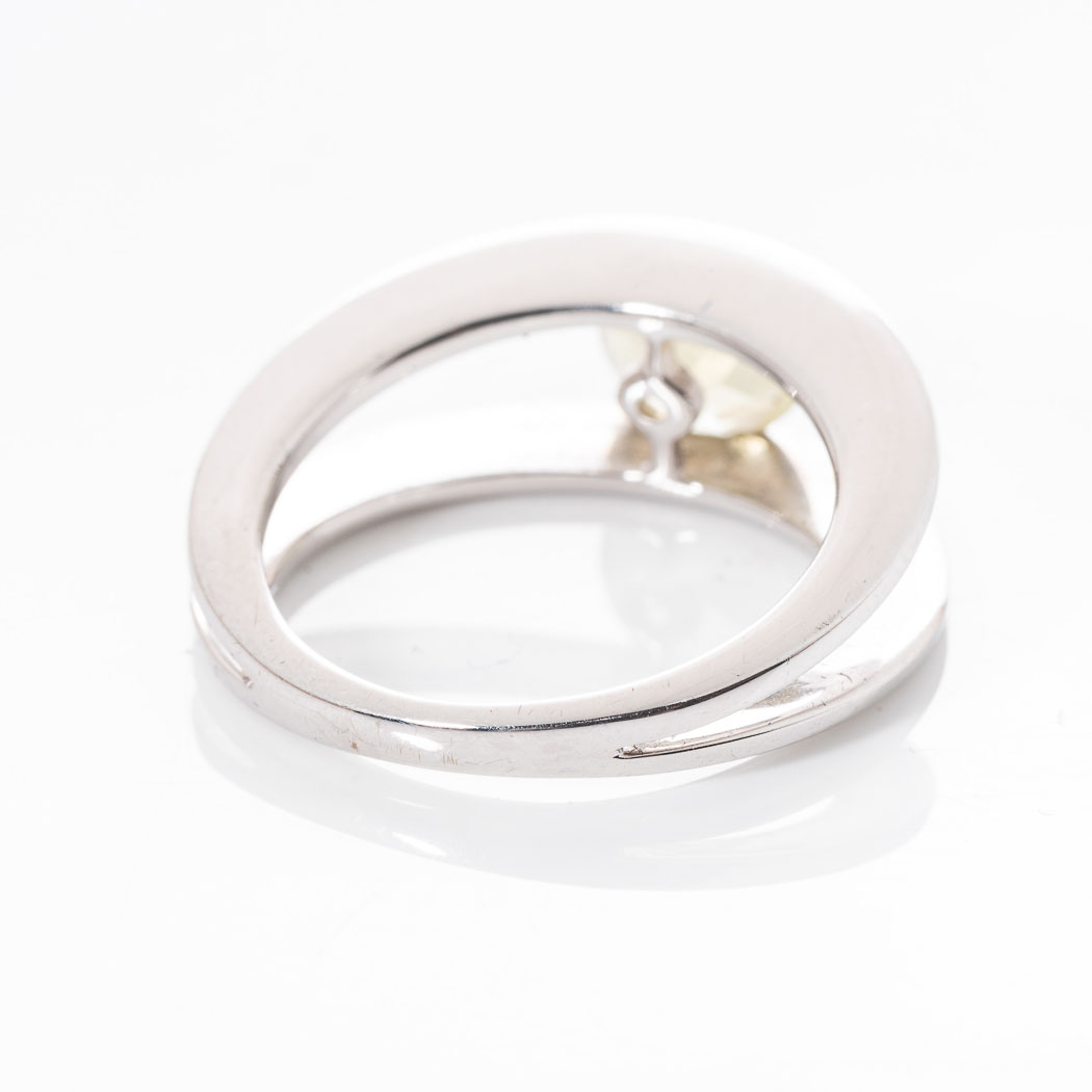 AN 18CT WHITE GOLD DRESS RING Tension-set to the centre with a round brilliant-cut lemon quartz - Image 2 of 2