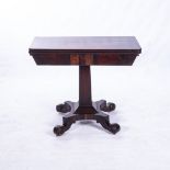 A WILLIAM IV MAHOGANY CARD TABLE The hinged rounded rectangular top enclosing a baize-lined