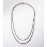 A DIAMOND TENNIS NECKLACE Designed as a double row of 391 round brilliant-cut claw-set diamonds with