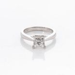 A PLATINUM SOLITAIRE RING Claw-set to the centre with a radiant-cut diamond weighing 1,56cts, colour