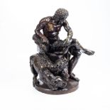 A BRONZE STATUE OF HERCULES AND CERBERUS, CONTINENTAL SCHOOL Depicting Hercules seated with Cerberus