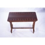 A VICTORIAN MAHOGANY AND INLAID STRETCHER TABLE The rounded rectangular top above a plain frieze,