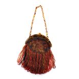 AN ORIGINAL 1920’S DECO BEADED BAG With Bakelite handle and frame. Beautifully lined, with little