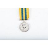 BRITISH KOREA MEDAL MINIATURE Complete with ribbon. .July 1951